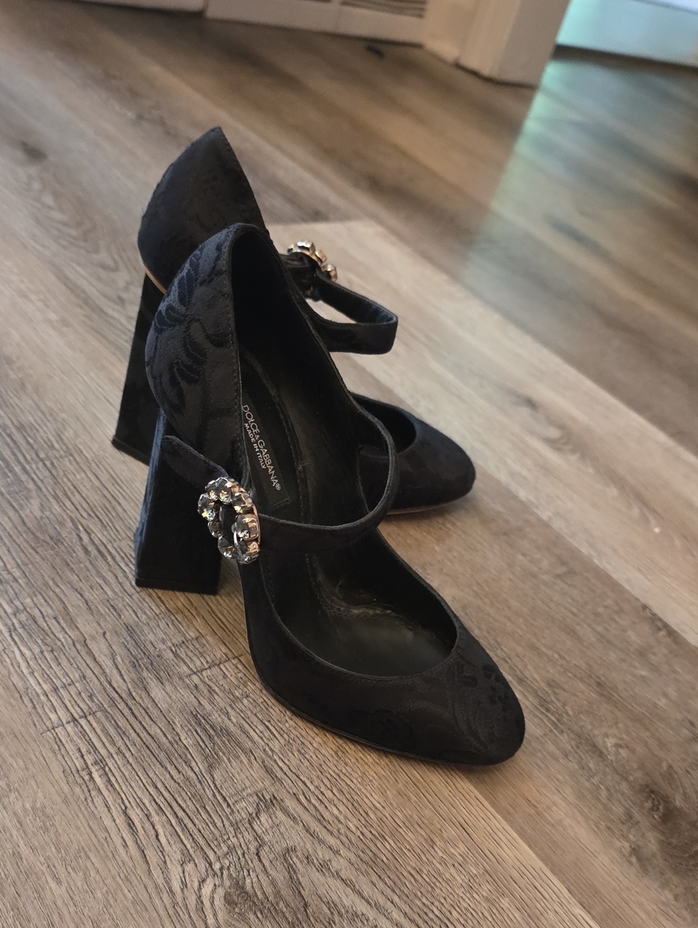 Dolce & Gabbana Black Embossed Mary Jane Heels with Crystal Buckle Accent